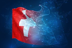 Illustration der Schweizer Flagge, die in einer digitalen Struktur ausläuft (Foto: freepik, coffeemill) - Schweizer Banken: UBS und Credit Suisse und Co. planen Digital-Geld