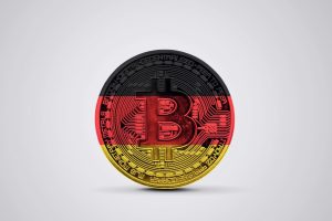 Deutschland-Flagge auf einem Bitcoin Kryptowährung - Deutschland bei Krypto-Ranking Spitzenreiter