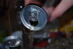 Open Energy Drink Can being poured