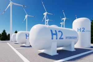 Windkraft-Anlagen und Tanks für Wasserstoff (Foto: Freepik, meshcube) - Batterie-Innovation: Effizient Strom speichern und Wasserstoff produzieren