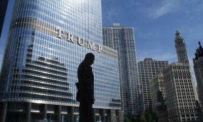 Man in front of TRUMP Building