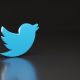 Twitter Logo blauer Vogel auf schwarzem Hintergrund